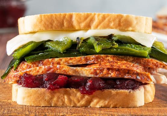 Turkey sandwich with poblano peppers, cranberry sauce and white cheddar